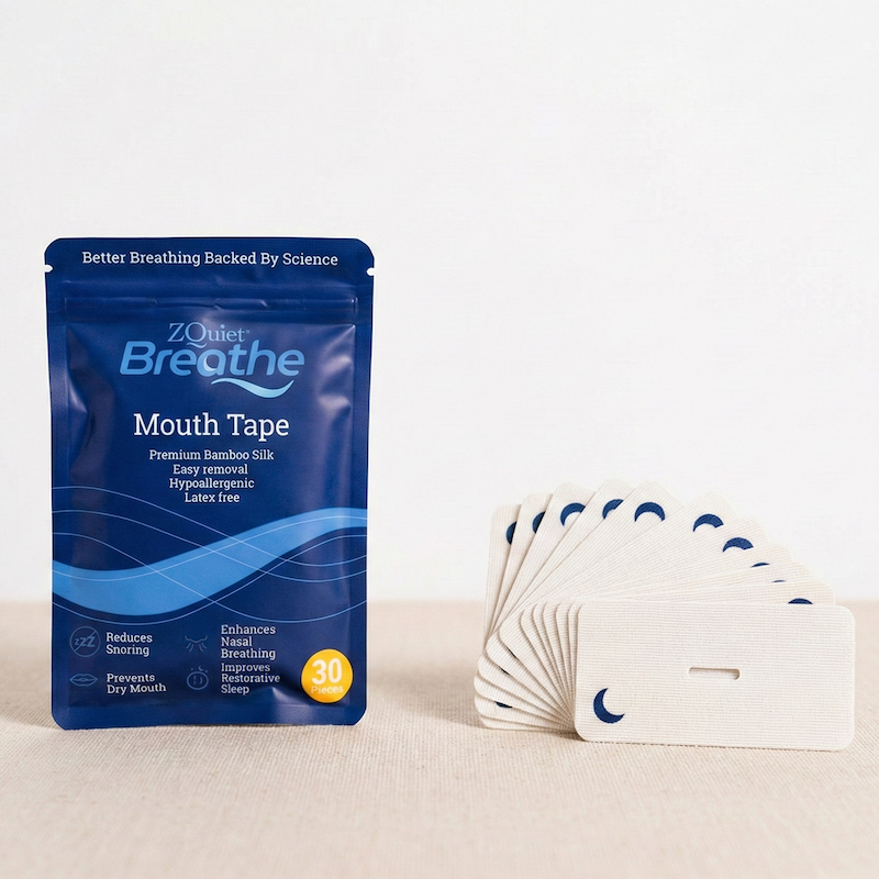 ZQuiet Breathe mouth tape packaging with a small stack of tapes on a beige background